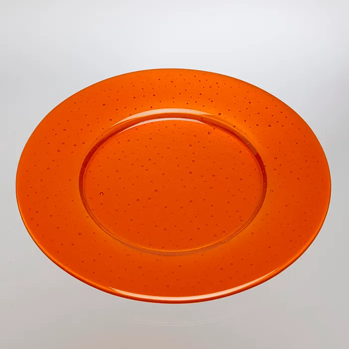 Platzteller aus orangefarbenem Glas